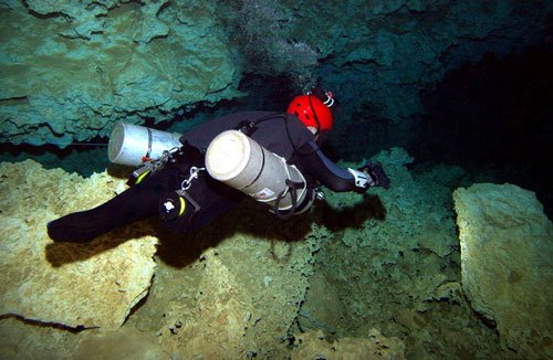 Wounded warrior suiting up for SUDS dive program